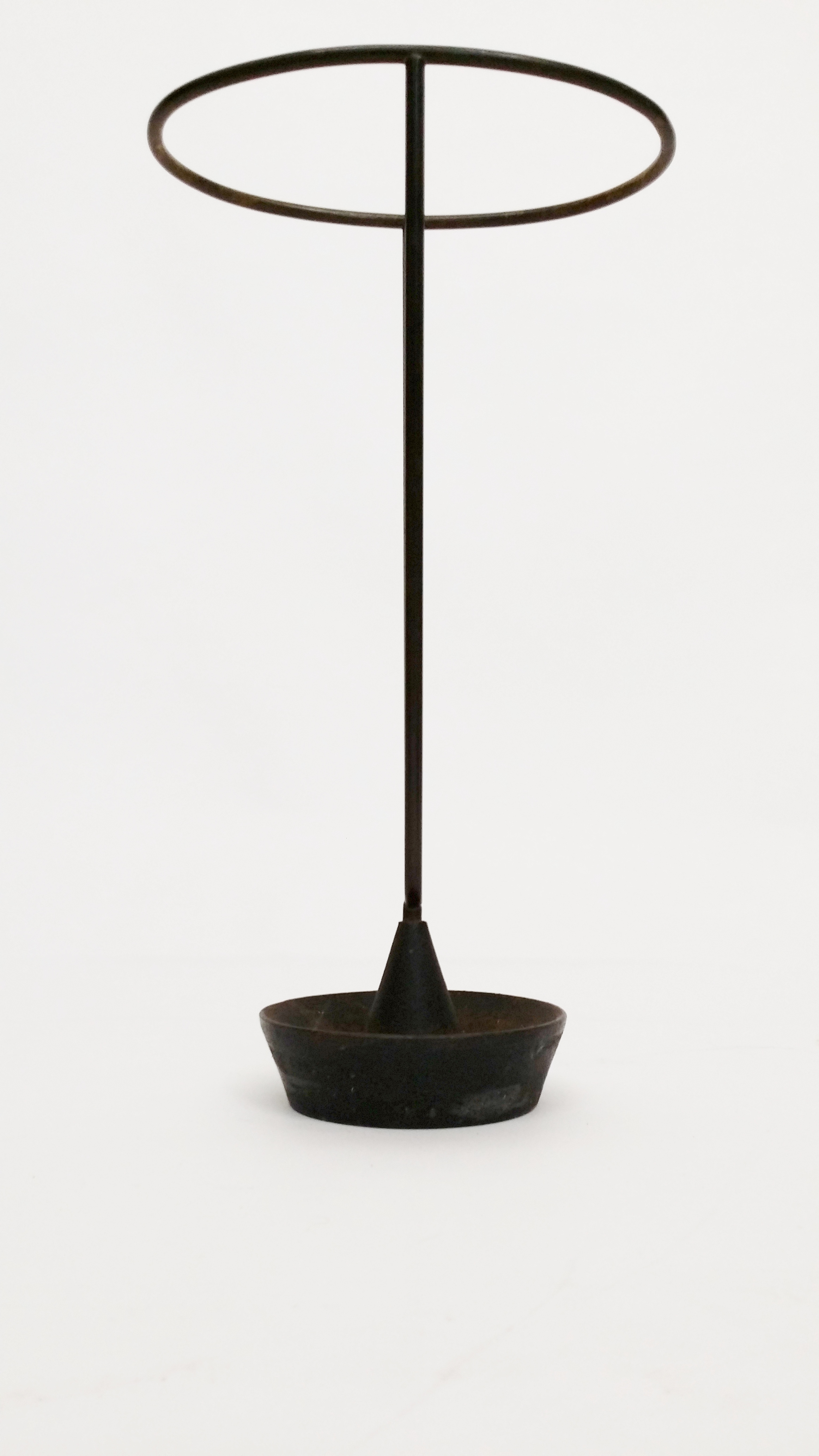 Designed by Carl AubÃ¶ck umbrella stand